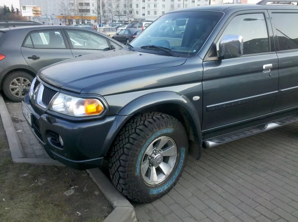 Колеса паджеро спорт 1. Диски Mitsubishi Pajero Sport 1. Mitsubishi Pajero Sport 2007. Шины 265 75 r16 на Mitsubishi Pajero Sport 1. Mitsubishi Pajero Sport 1 колеса.