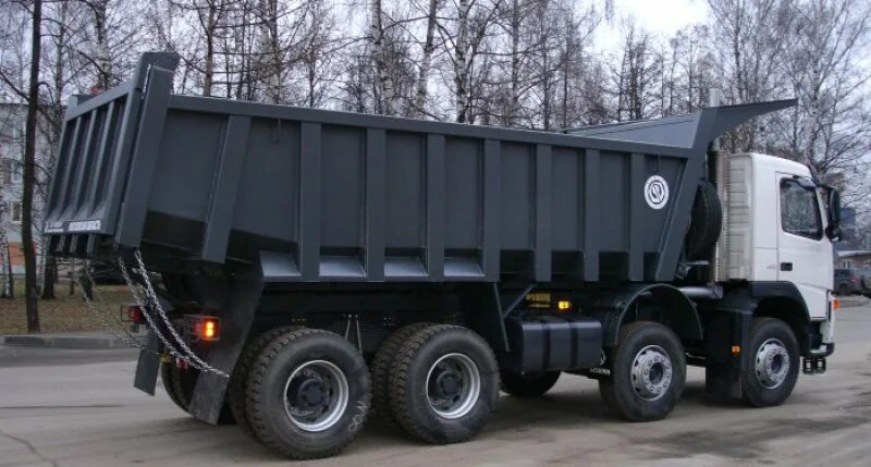 Самосвал шакман четырехосный. Ман 4 осный самосвал. Volvo 400 самосвал объем кузова. Ман tga 41. Самосвал хово 3 осный.