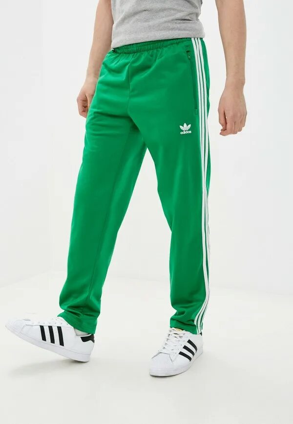 Адидас ориджинал штаны зеленые. Adidas Firebird брюки Green. Штаны adidas Originals зеленые. Adidas Originals брюки спортивные adicolor Classics. Купить зеленый адидас