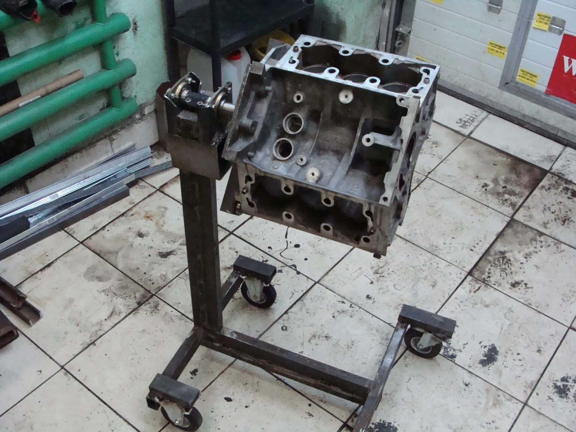 Стенд для двигателя своими руками. Кантователь двигателя ямз 236. Кантователь для капремонта двс ваз 2106. Кантователь двигателя стационарный 2000 кг. Кантователь для змз 402.