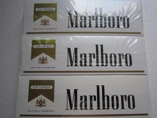Сигареты Marlboro Gold. Блок сигарет Мальборо. Сигареты Мальборо Голд 100ка. Блок сигарет Мальборо Гольд.