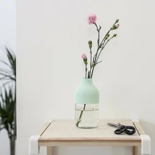 The vase is on the table