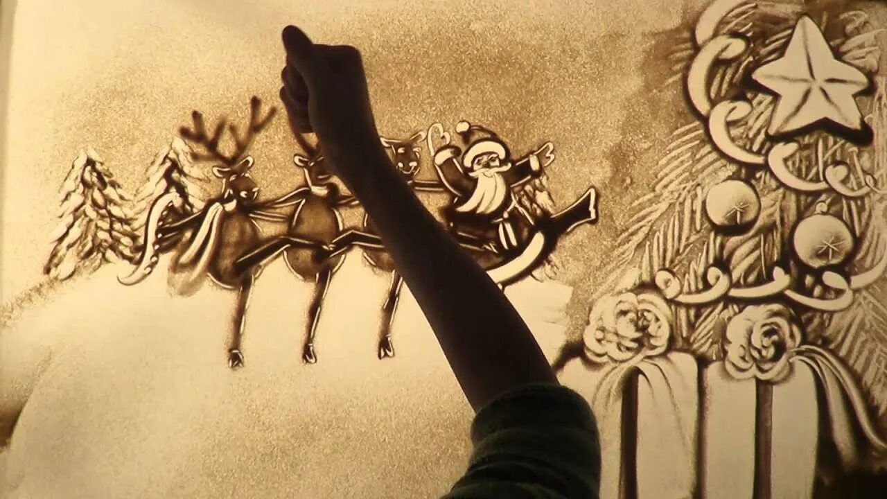 Рисование песком. Песочное шоу новый год. Песочный новый год. Рисование песком новый год. Песочный новый год.