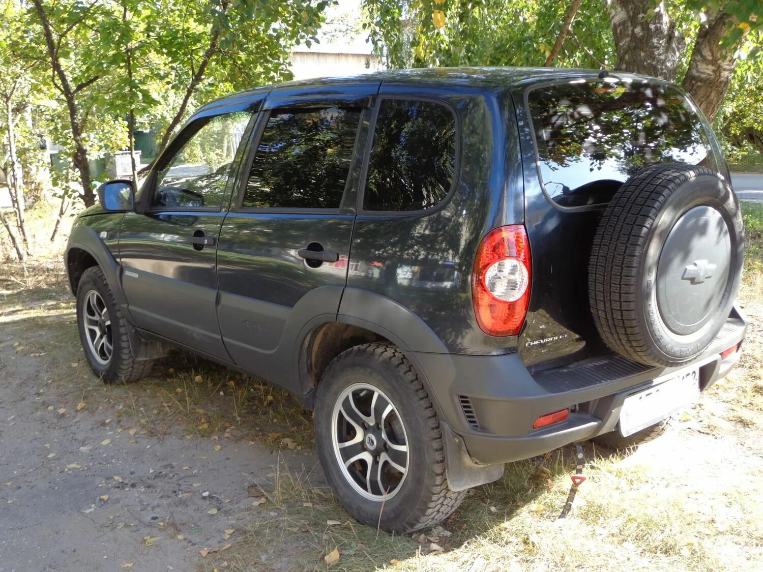 Chevrolet Niva 2012. Нива Шевроле 2012г. Шевроле Нива 2012 цвет черный. Chevrolet Niva, 2012г автору.