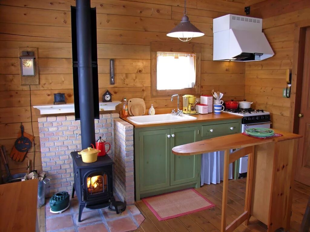 Gallery of Patagonia Lodge / Cooprogetti Arquitectos - 13 Wood stove surround, W