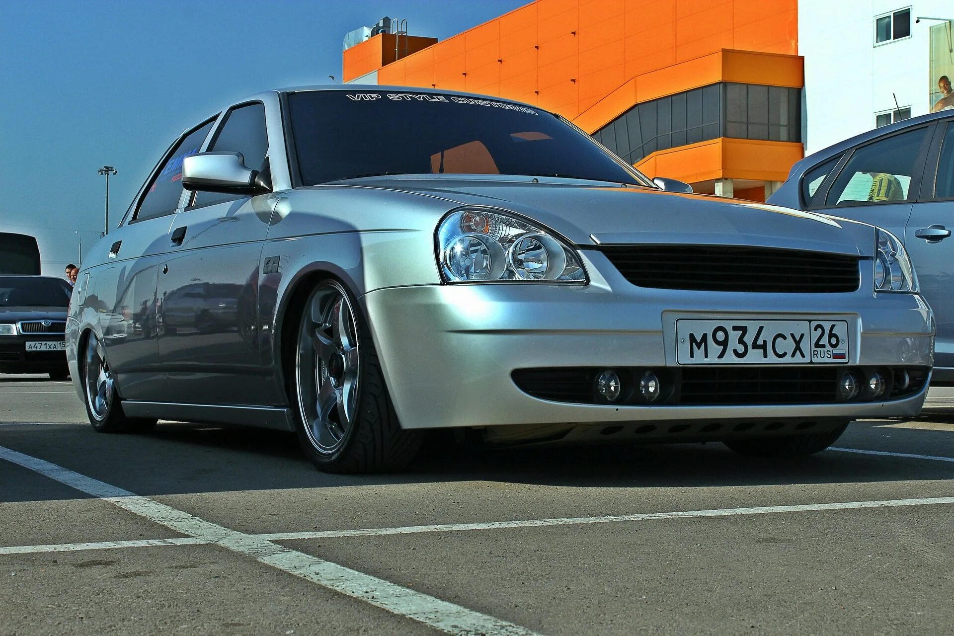 Лада приора. Ваз 2115 ламбо двери. Lada priora заниженная 102. Фонари тюн авто приора. Задние фонари тюн авто приора.