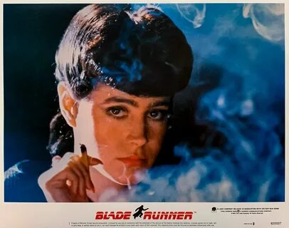 Sean Young as the cigarette-smoking femme fatale, Rachael. 