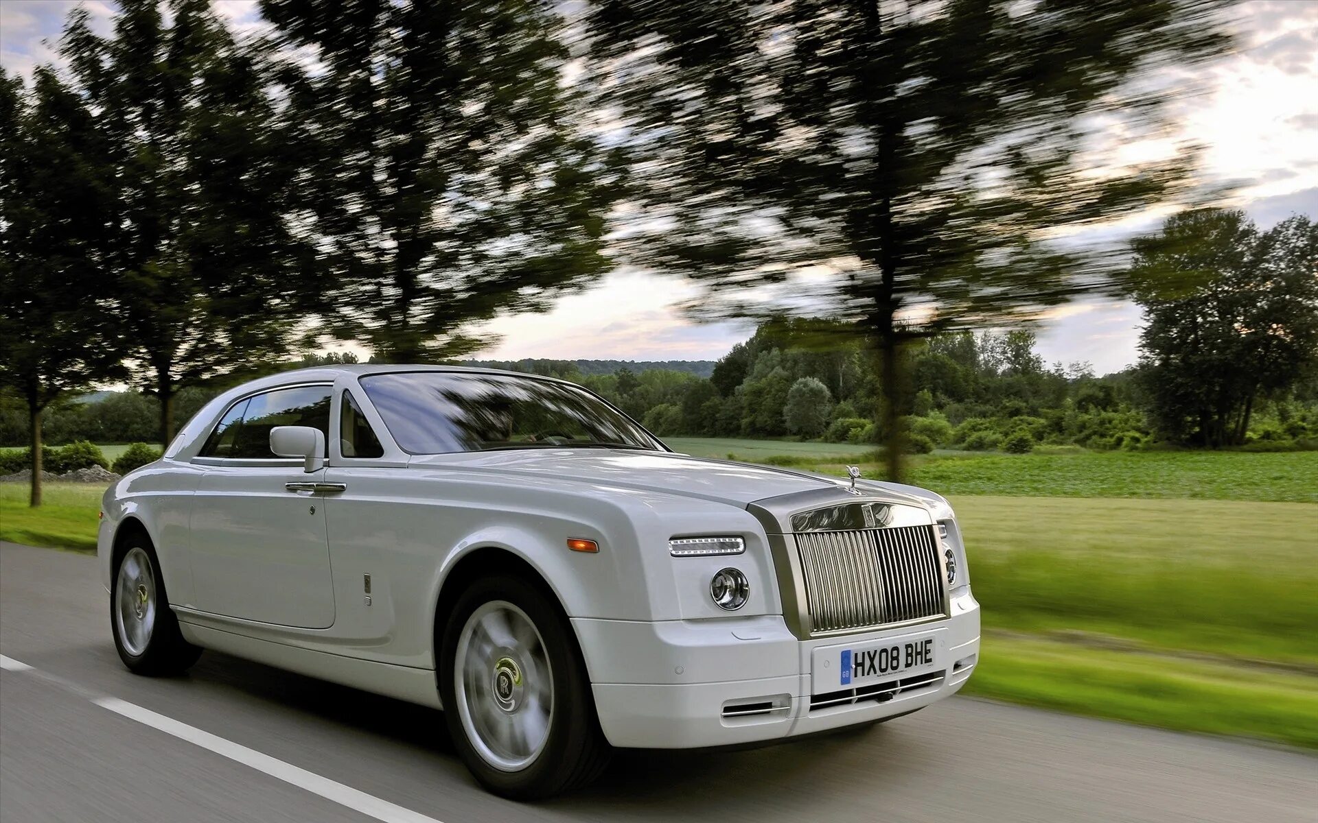 Автомобиль rolls royce. Роллс Ройс Фантом купе. Rolls Royce Phantom 2008. Rolls Royce Phantom 2003 белый. Rolls Royce 2.