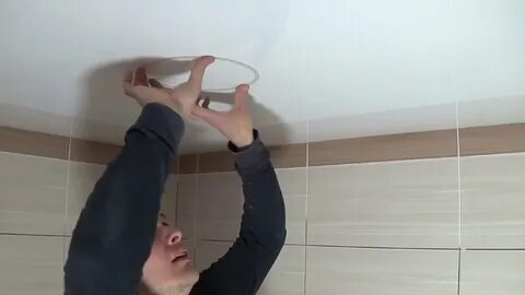 Как установить светильник в натянутый потолок