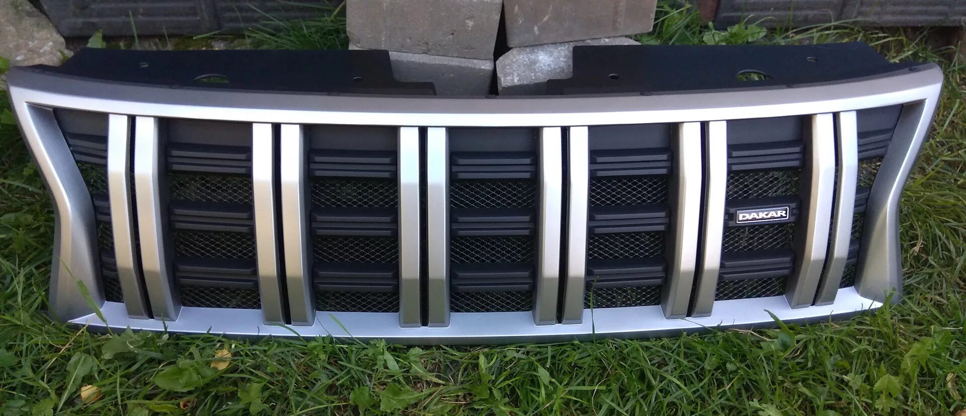 Renault logan 1 решетка радиатора. Решетка радиатора рено логан фаза 1. Решетка радиатора рено логан. Решетка радиатора renault sandero 1. Renault решетка радиатора.