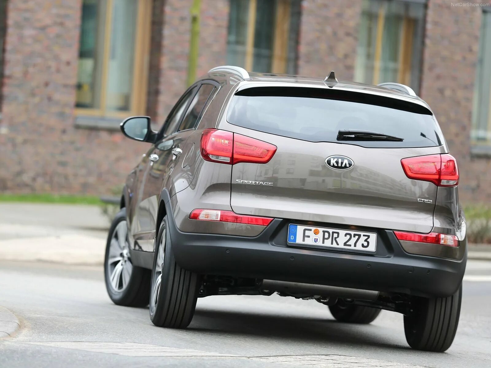 Заднее фото. Kia Sportage 2013 сзади. Kia Sportage 3 вид сзади. Кия Спортейдж 97. Киа Спортейдж 2015 вид сзади.