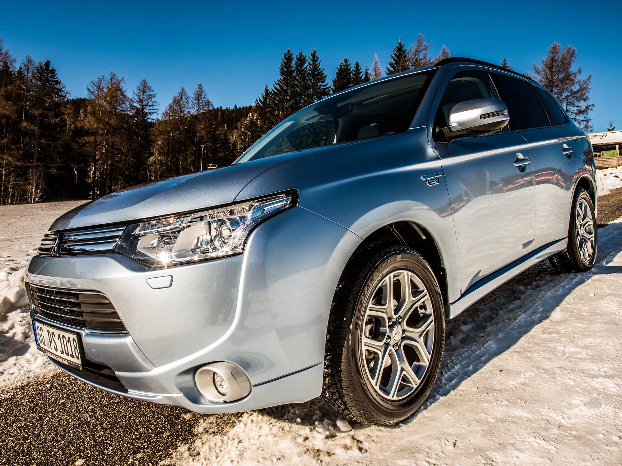 Mitsubishi Outlander PHEV 2014. Мицубиси Аутлендер 3. Mitsubishi Outlander 2012. Аутлендер 3 PHEV.