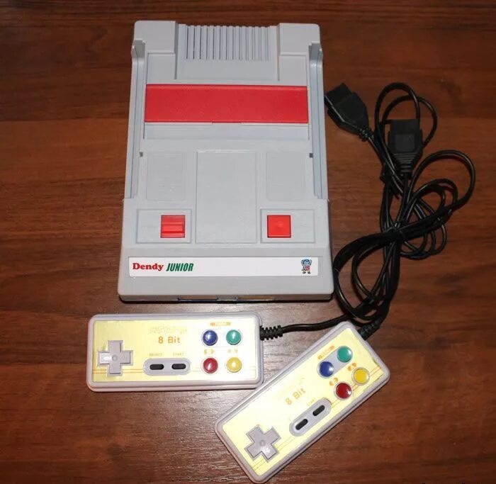 Игровая приставка dendy junior. Junior 8. Денди джуниор 1 упаковка. Junior 8. Junior 10 8 bit внутри.