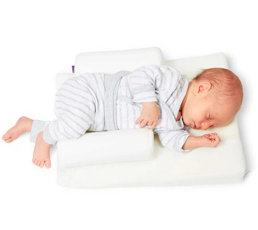 Какую подушку выбрать ребенку. Traumeland подушка Visco 32 x 40 см.0-8 мес.. Traumeland позиционер для сна. Ортопедическая подушка для младенцев. Подушка позиционер для новорожденных.