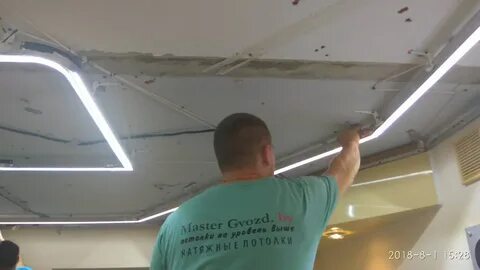 Как установить светильник в натянутый потолок