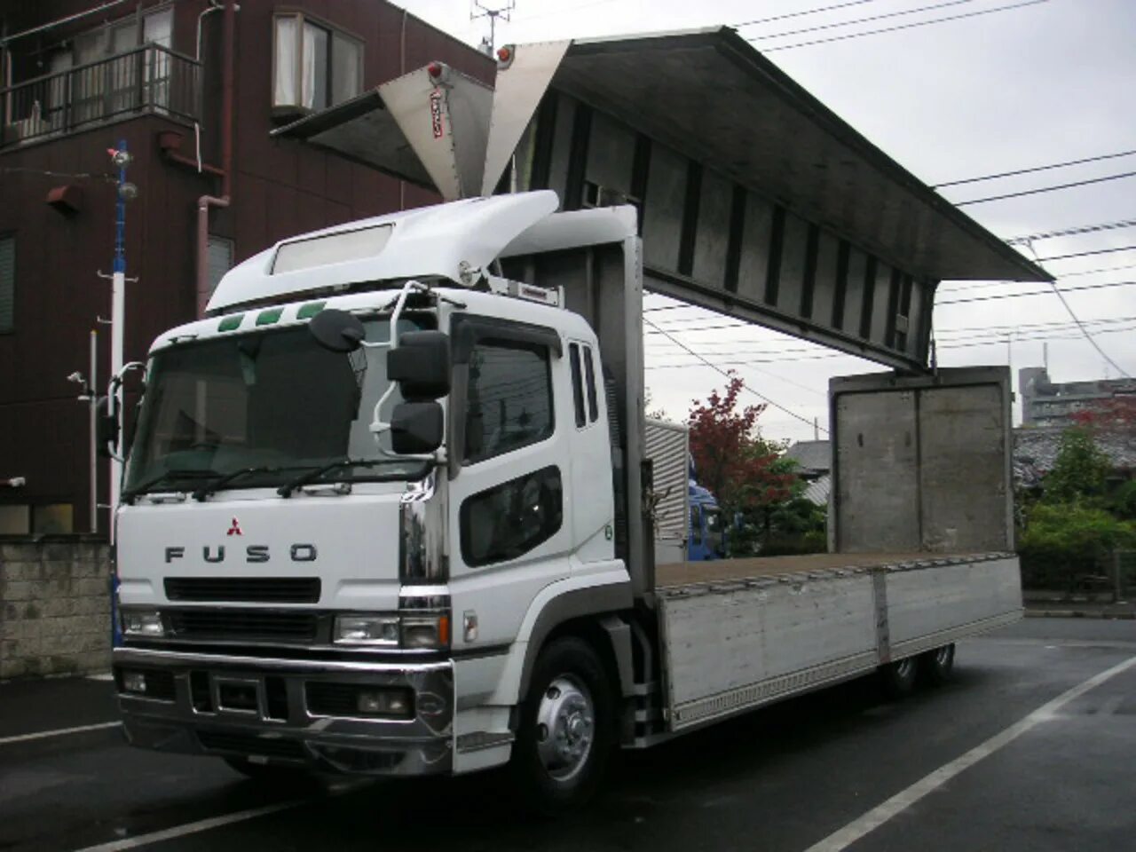 Mitsubishi fuso great. Mitsubishi Fuso 5 тонн. Митсубиси Fuso 10 тонн. Mitsubishi Fuso super great 1995. Mitsubishi Fuso Canter 5 тонн.