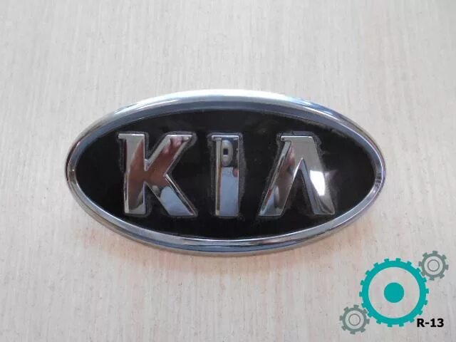 Значки киа рио 3. Kia Rio 3 значок. Значок Kia 424*600. 863104x000. 86310bw000.