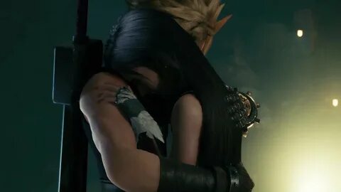Tifa crying on Cloud's shoulder.
