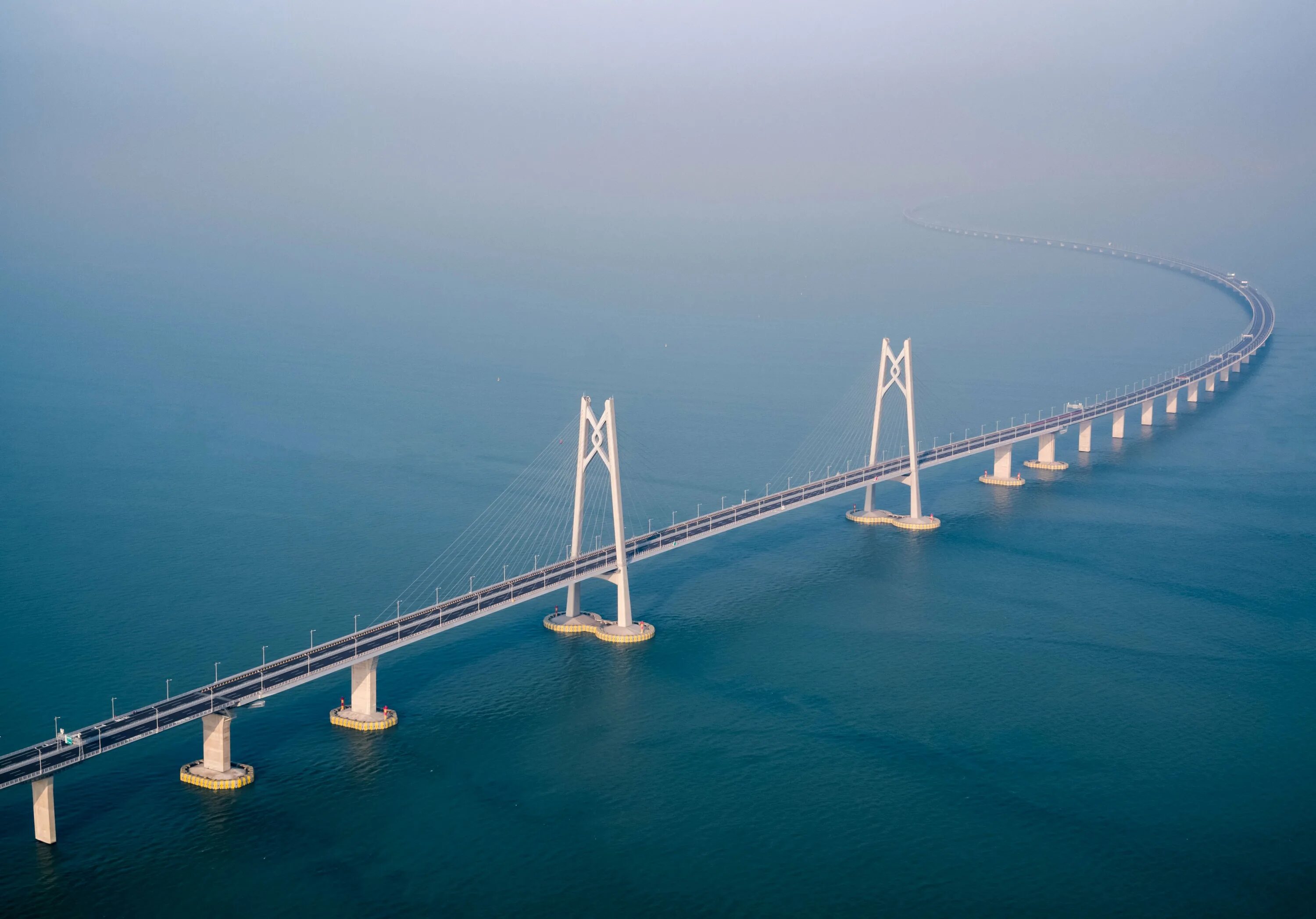 Какой длины мост. Мост Гонконг - Чжухай - Макао. Даньян-Куньшаньский виадук Китай. Мост Даньян-Куньшаньский виадук. Мост Ханчжоу Бэй (Китай).