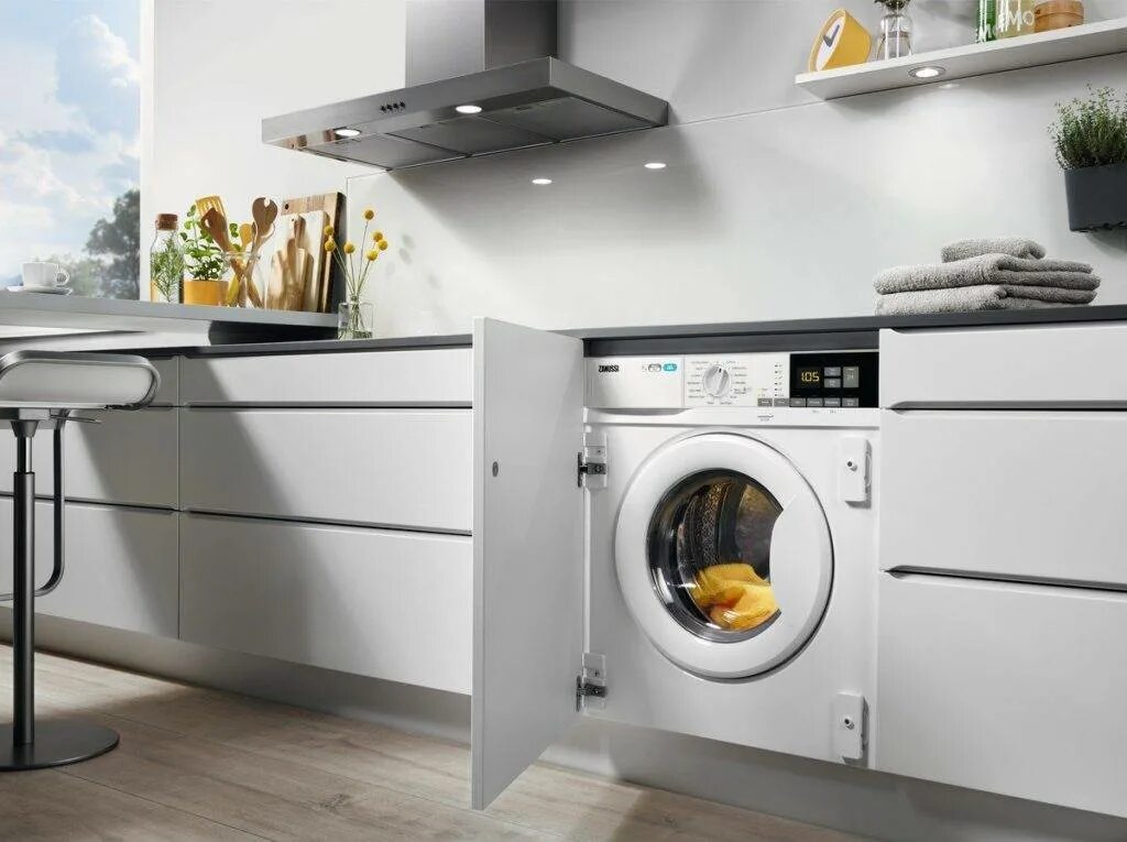 Стиральная машина встроенная в кухонный гарнитур. Zanussi z716wt83bi. стиральная машина встраиваемая в кухню 58х60. встраиваемая стиральная машина smeg. встраемывая стиральная машина шириной 60см.