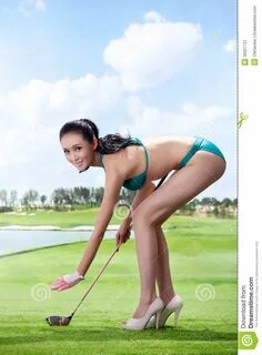 Club Di Golf Sexy Della Tenuta Della Donna Immagine Stock - Immagine di tenuta, 