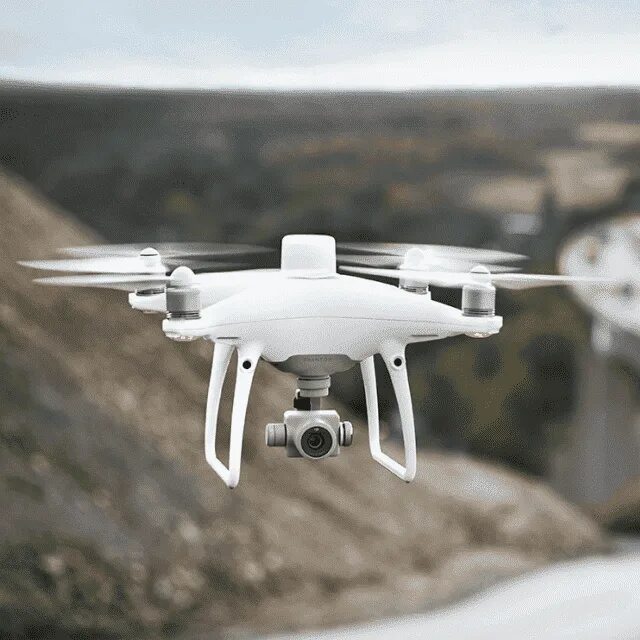 Как называется беспилотник с шестью моторами. Phantom 4 RTK. DJI m30т. Мультикоптер бпла400т. Phantom 4 RTK БПЛА.