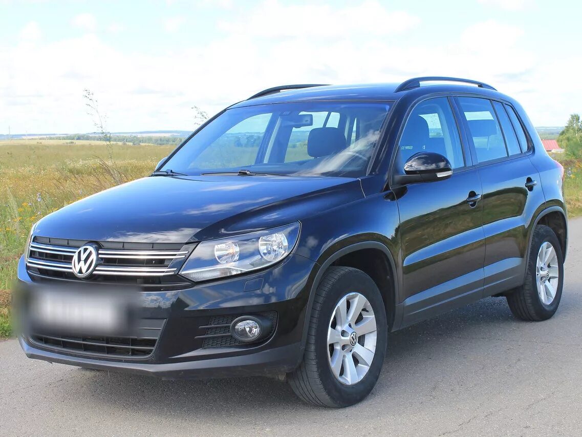 Фольксваген тигуан механика купить. Tiguan 2012. Volkswagen Tiguan 2012 года. Volkswagen Tiguan 1.4 МТ. Tiguan 1.4 MT 2012.