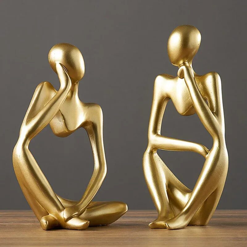 Золотые фигурки. Золотые фигуры. Абстрактные статуэтки для интерьера. Золотая статуэтка девушки. Фигура женщины золото.