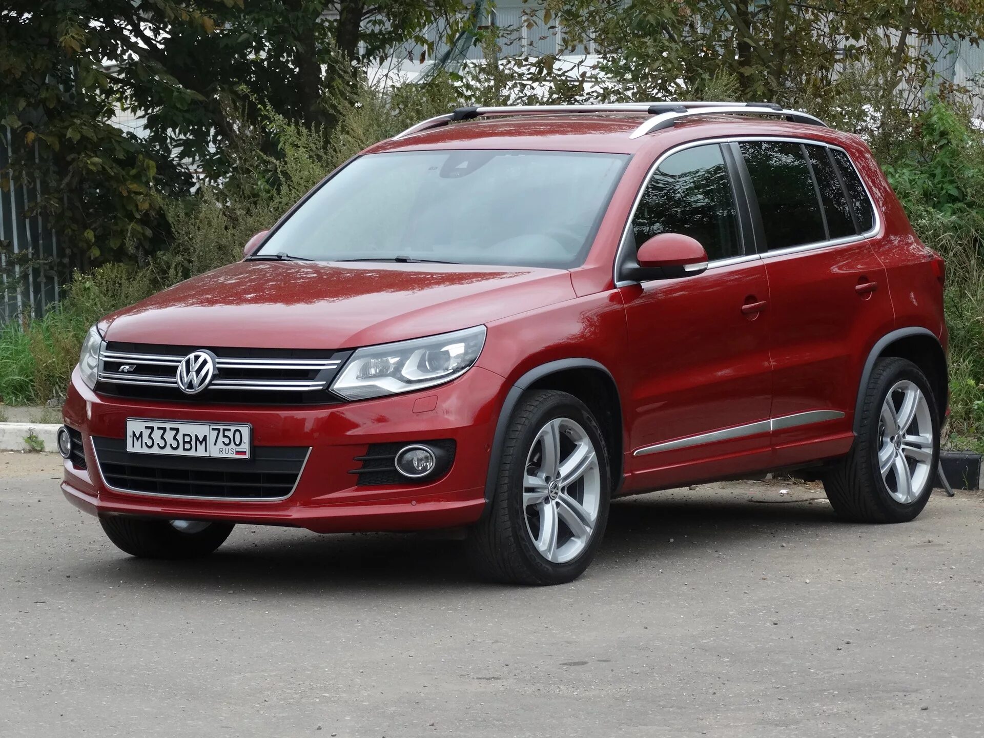 En 5 n. Tiguan 1. VW Tiguan 5n. Volkswagen Tiguan 1 Рестайлинг. Tiguan 2013 Sport.