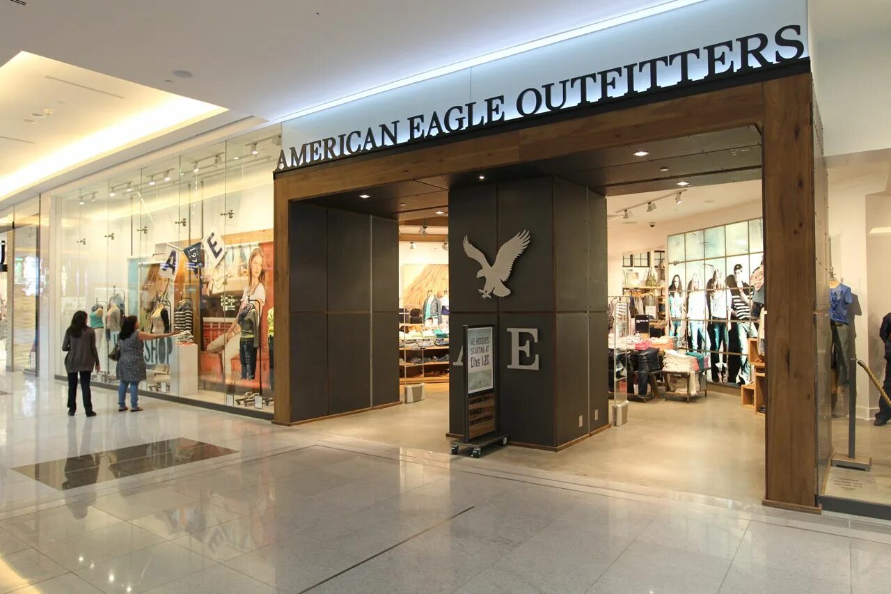 Американ игл. American Eagle Outfitters одежда. American Eagle Dubai Mall. Американ Иглс Дубай. Американ Eagle отдел Дубай Молл.