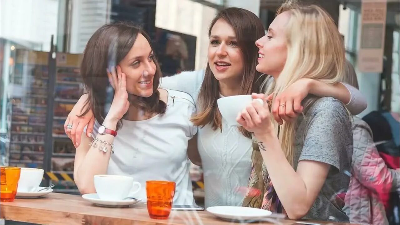 Free Photo Cheerful woman with book in cafe