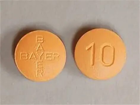 Bayer 10. Черные таблетки bayer. таблетки оранжевого цвета. виагра оранжевая таблетка. bayer круглые таблетки.