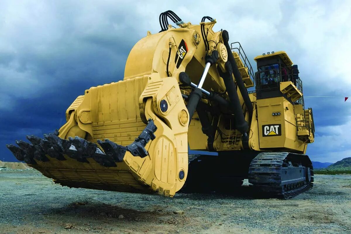 Самые мощные товары. Caterpillar 6090 FS. Caterpillar 6090 FS Excavator. Скрепер Caterpillar 637f. Самый большой Катерпиллер бульдозер в мире.