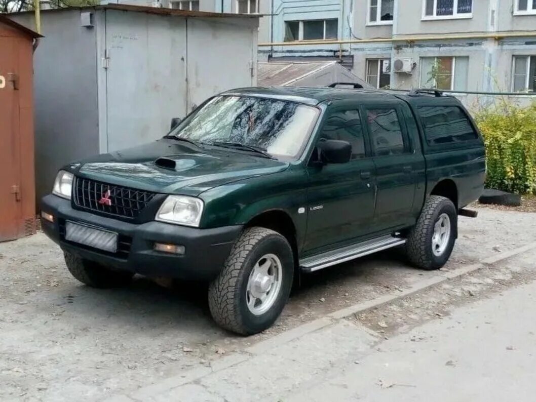 Mitsubishi l200 старый кузов. Мицубиси л200 2004. Mitsubishi l200 III. Митсубиси л200 2005.