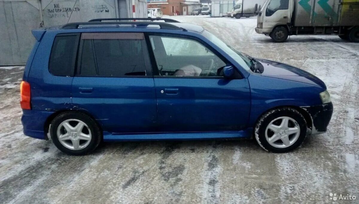 Мазда демио 2000 купить. Mazda Demio 2000. Мазда Демио синяя 2000. Mazda Demio 2000 1.5. Голубая Мазда Демио 2000.