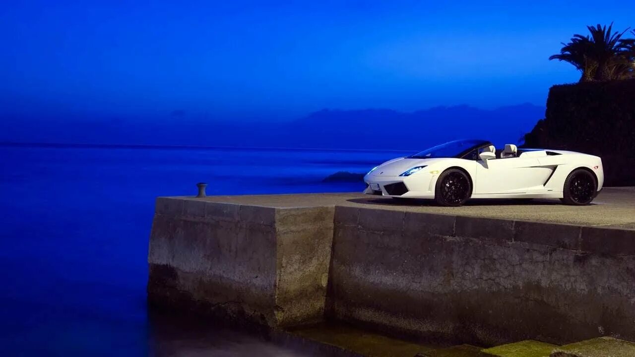Автомобиль на берегу черного моря. На море на машине. Ferrari gtc4lusso обои. Ferrari gtc4lusso. Кабриолет море.