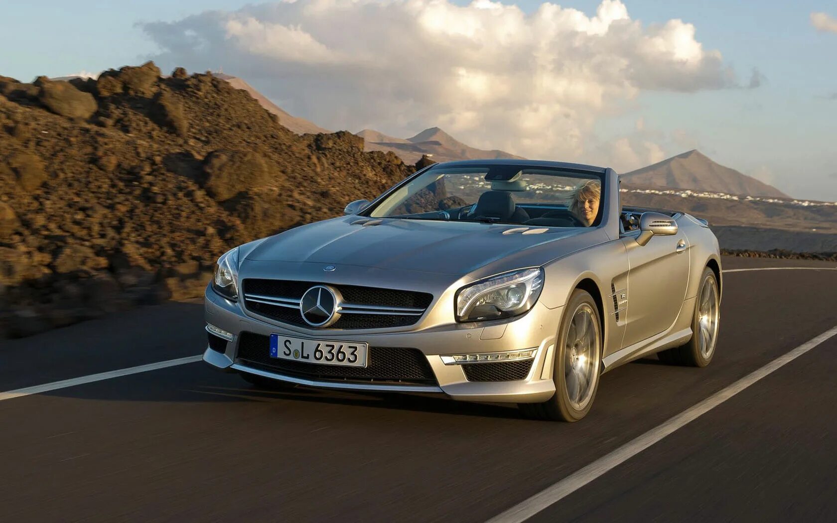 Машина мерседес фото. Мерседес SL 63 AMG. Мерседес сл 63 АМГ. Mercedes SL 63 AMG 231. Mercedes sl63 AMG r231.