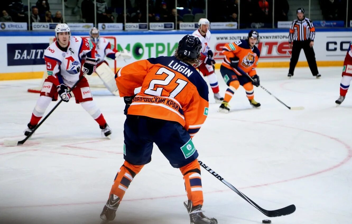 Кхл это. Хоккей Локомотив Амур. Хоккей КХЛ. KHL хоккей. КХЛ фото.