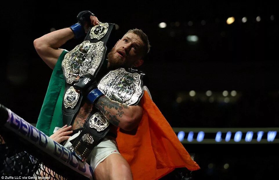 Fighting the first. Конор МАКГРЕГОР. Конор МАКГРЕГОР юфс. Connor MCGREGOR 2 пояса. Connor MCGREGOR Champion.