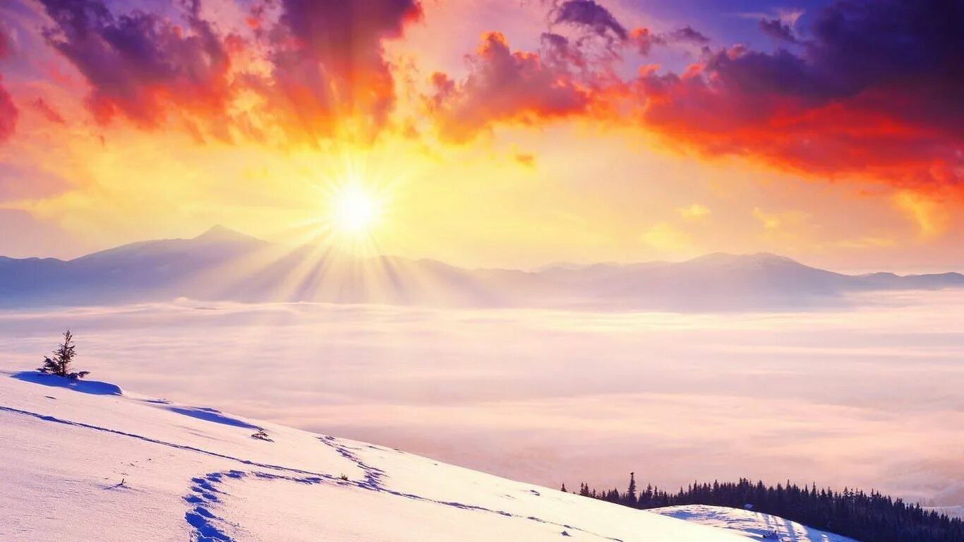 Рассвет в горах зимой. Зима солнце. Рассвет в горах. Рассвет и снег в горах. Красивое солнце зима