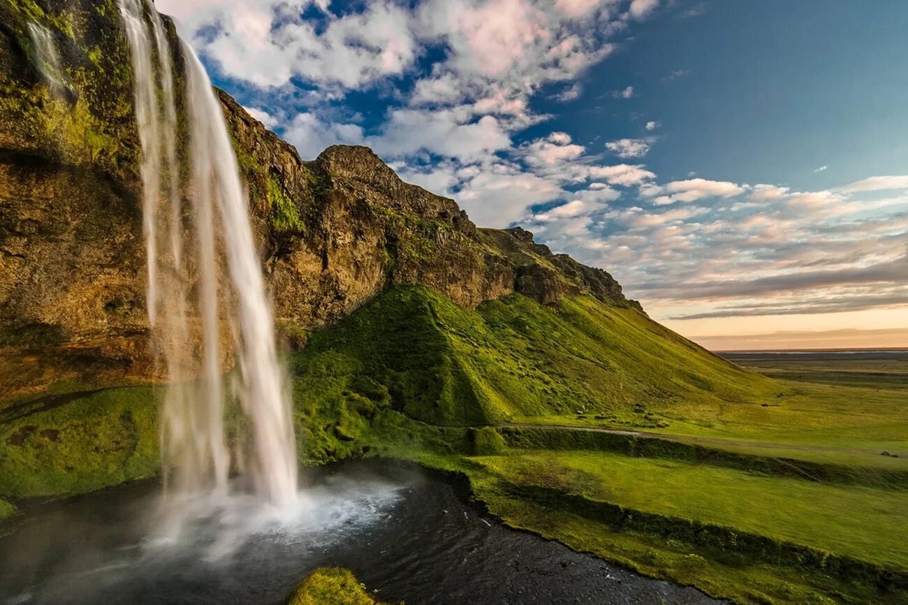 Самые красивые медленно. Водопад Сельяландсфосс. Водопад Сельяландсфосс Исландия. Водопад Сельяландсфосс фото.