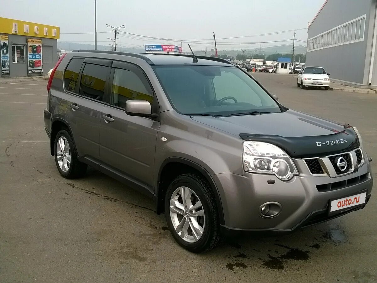 Продаж ниссан б у. Nissan x-Trail II Рестайлинг 2.5 4wd CVT (169 Л.С.) фиолетовый с пробегом на снегу. Ниссан х-Трейл купить в Красноярске. Продажа Ниссан в Красноярске.