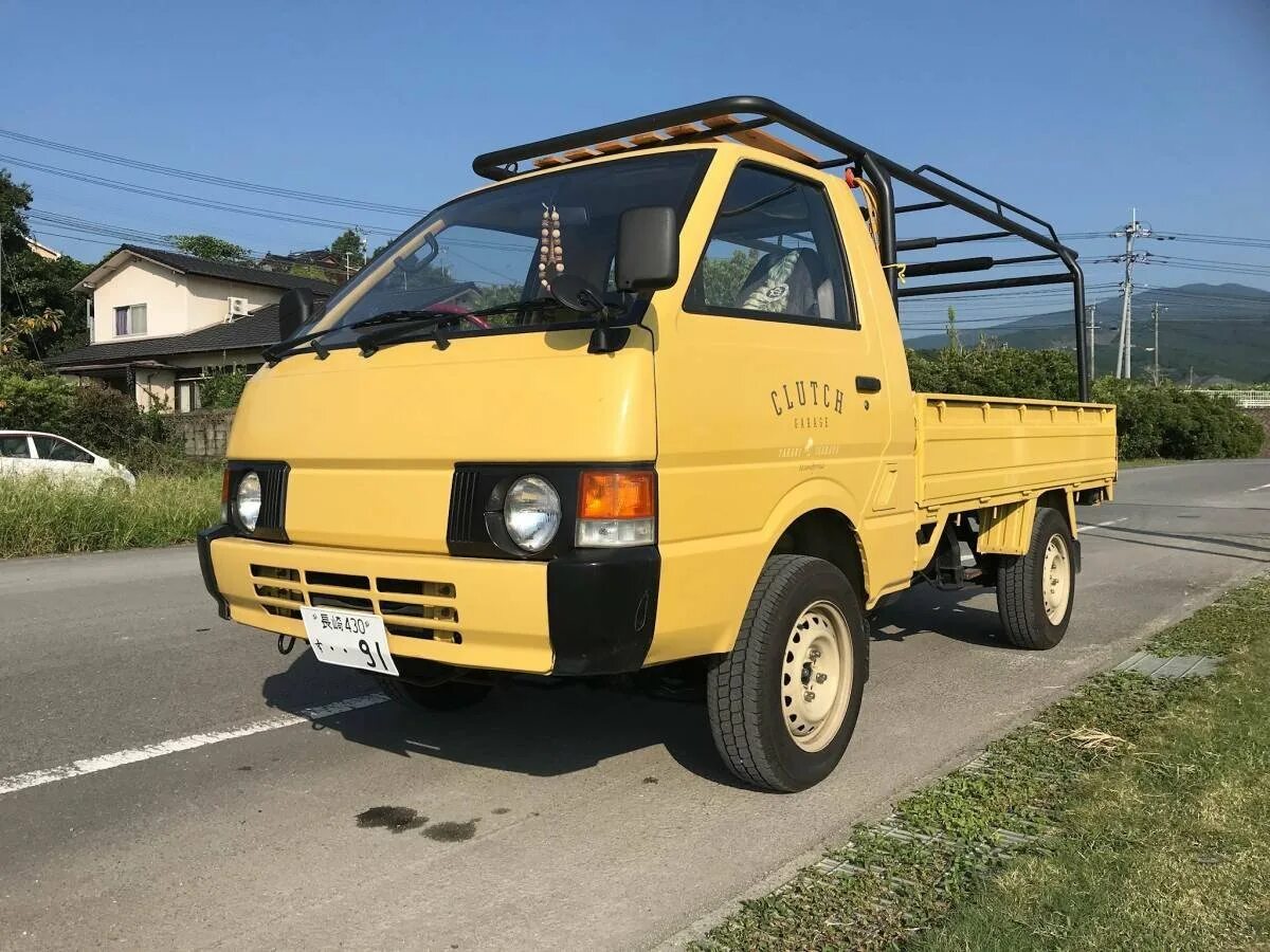 Грузовичок ниссан. Ниссан Ванетте грузовик 4х4. Nissan Vanette Truck c22. Nissan Vanette 4wd. Nissan Atlas 4wd 1990.