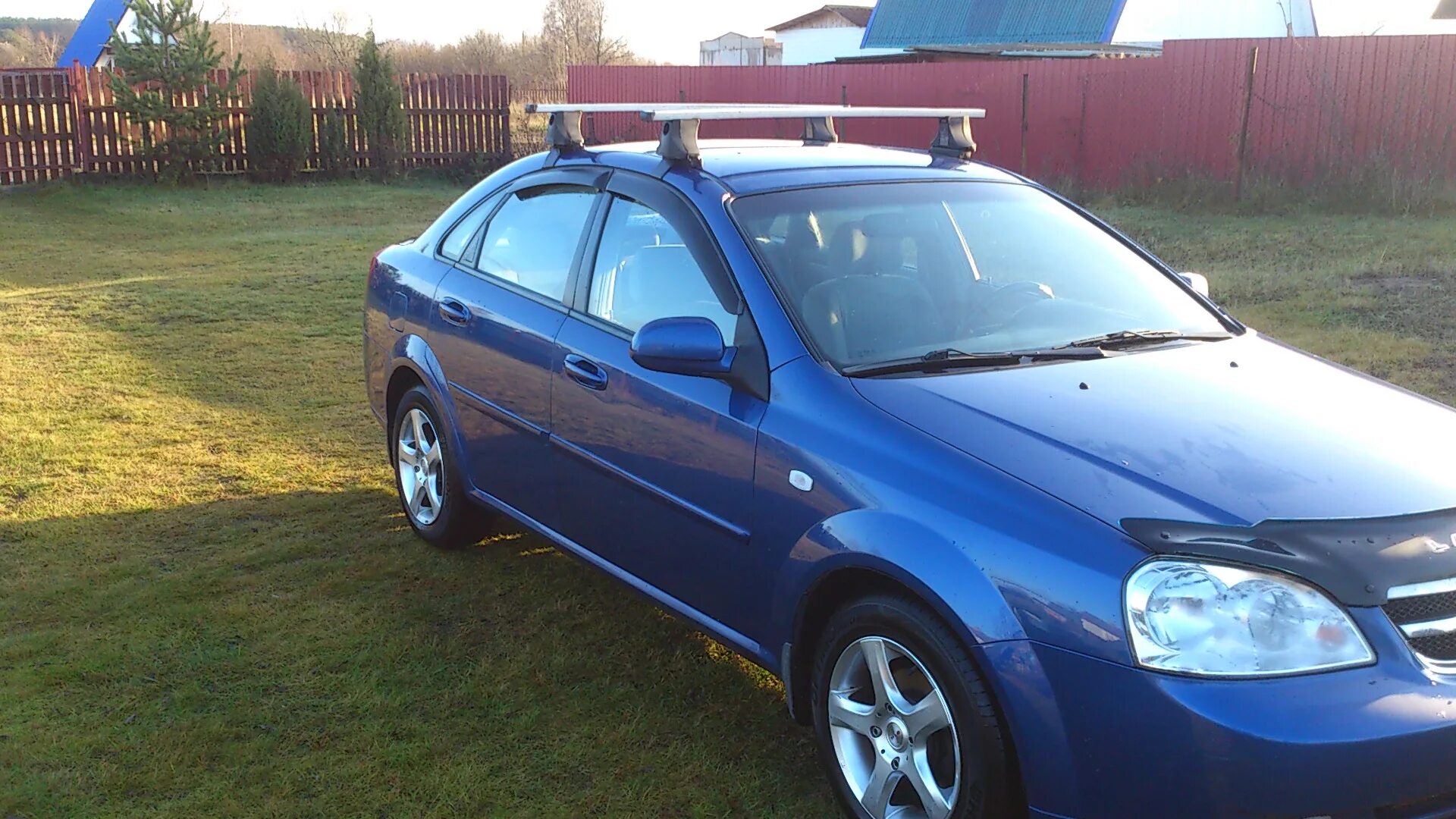 Купить багажник шевроле лачетти. Багажник на крышу Chevrolet Lacetti. Багажник на крышу Chevrolet Lacetti седан. Багажник на крышу Шевроле Лачетти седан 2008. Chevrolet Lacetti хэтчбек багажник на крышу.