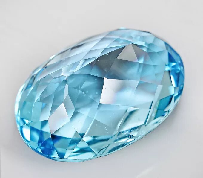 Как называется камень голубого цвета. Синий полудрагоценный камень. Голубой непрозрачный камень. Самоцветы камни топаз. Бирюзовый прозрачный камень.