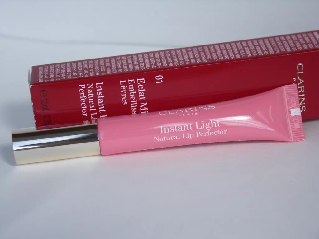 Блеск кларанс 01. Clarins Eclat minute 01. Блеск для губ Clarins natural Lip Perfector блеск для губ Clarins natural Lip Perfector 01. Блеск кларанс natural Lip Perfector 01.