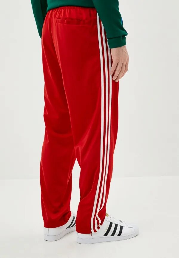 Штаны adidas Originals красные. Adidas Originals брюки спортивные fbird TP. Штаны адидас Essentials 3 оригинал красный. Трико adidas красные.