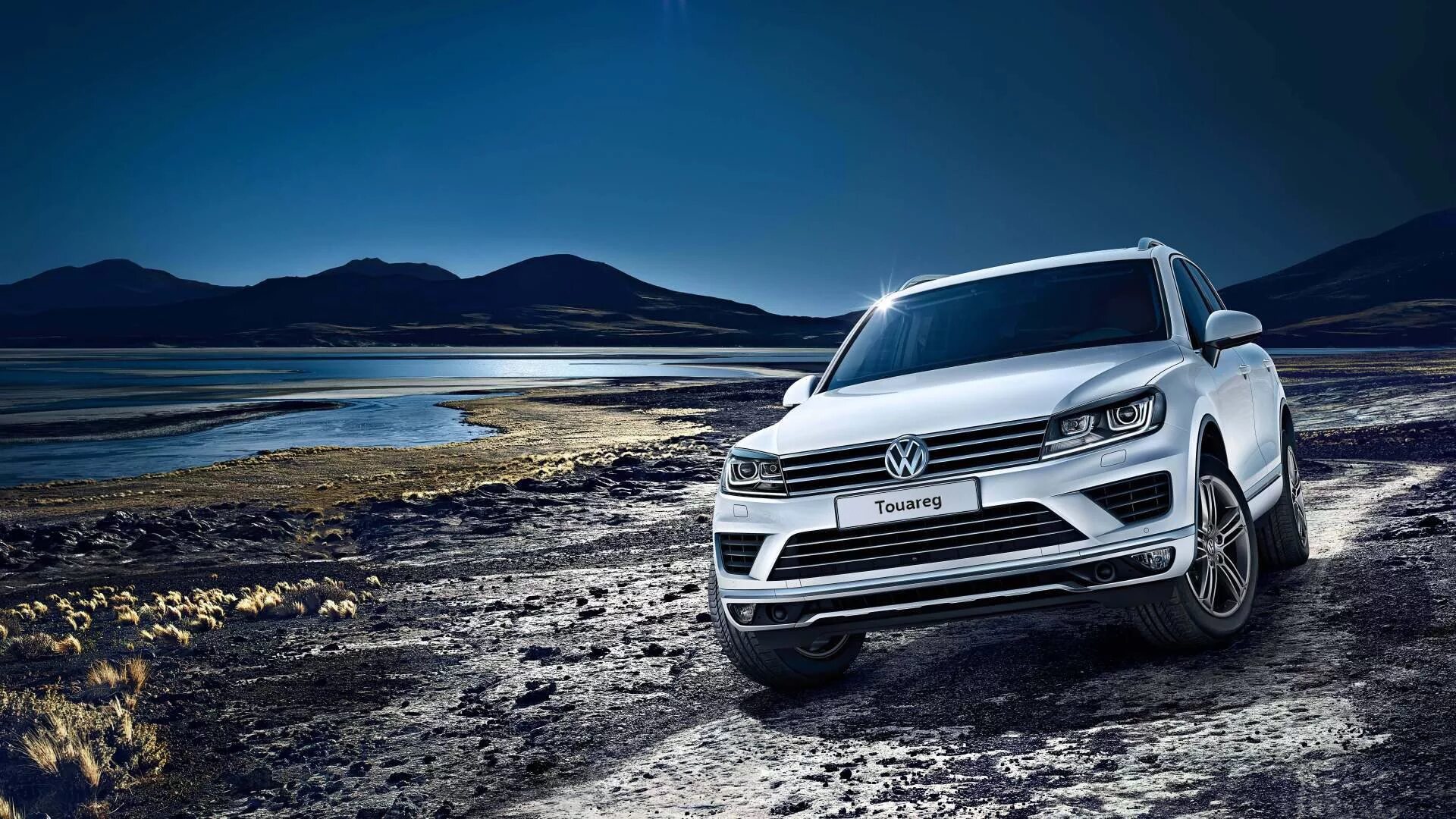 Фольксваген Туарег белый новый. Туарег 4. Volkswagen Touareg FL белый. Volkswagen Touareg 2 обои.