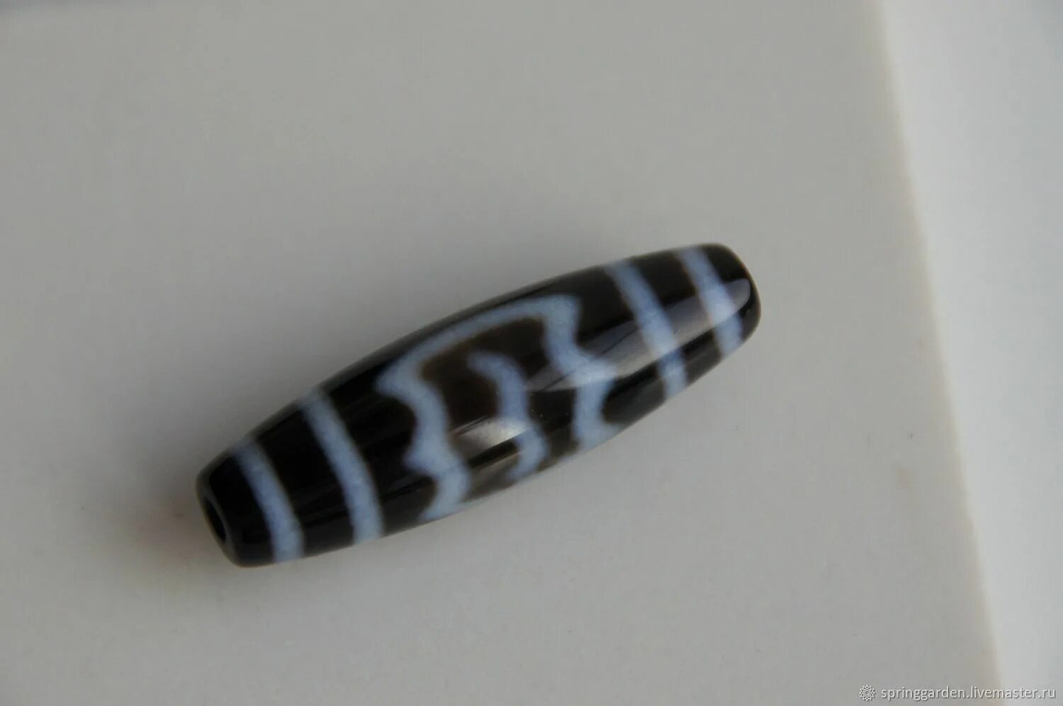 Бусины дзи 5 глаз гаруда молния. Бусина дзи птица гаруда. Гаруда дзи. Дзи гаруда и молния. Манубе бусина дзи бусины.