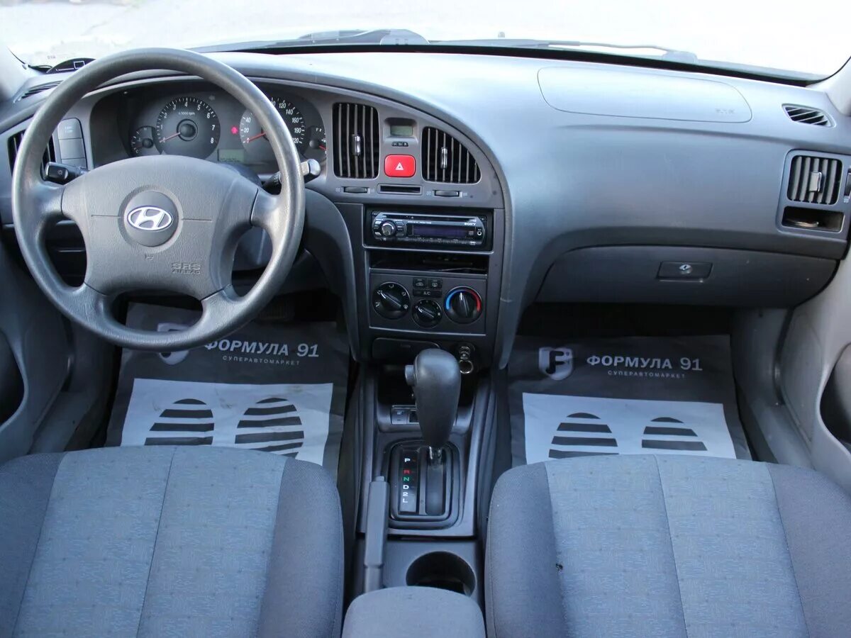 Хендай элантра xd 2005. Hyundai Elantra XD 2008 салон. Hyundai Elantra XD салон 2004. Hyundai Elantra III (xd2) салон. Hyundai Elantra XD салон.